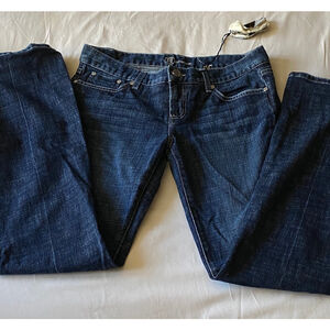 NWT BEBE Women’s Rare Blue Denim with Rhinestones in the Right Back Pocket.